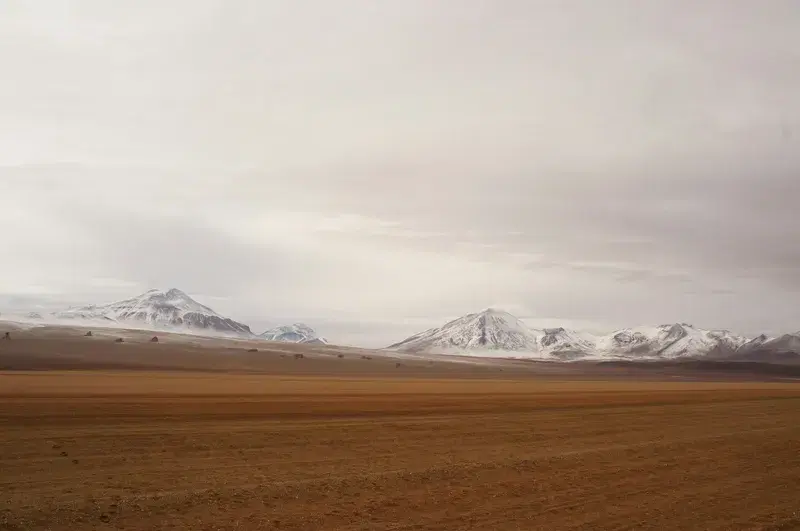 Cover Image for Finding Peace in Nature: The Serenity of Snowy Mountains and Desert Landscapes