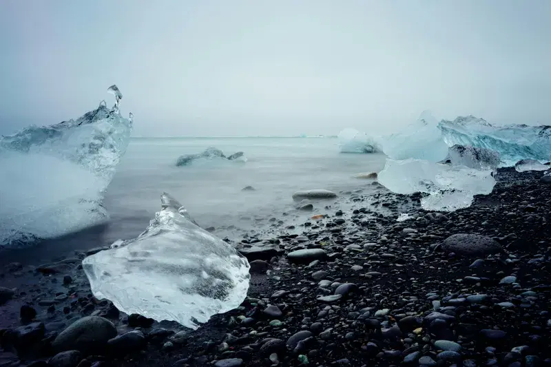 Cover Image for Finding Serenity in Nature: The Beauty of Ice on Black Beaches